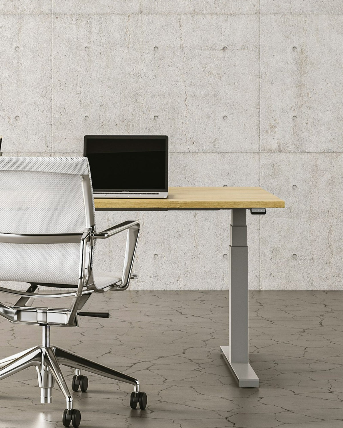 Office with a concrete wall, pendant lamps, a desk and a mesh office chair