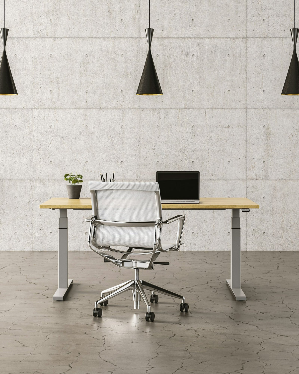 Office with a concrete wall, pendant lamps, a desk and a mesh office chair